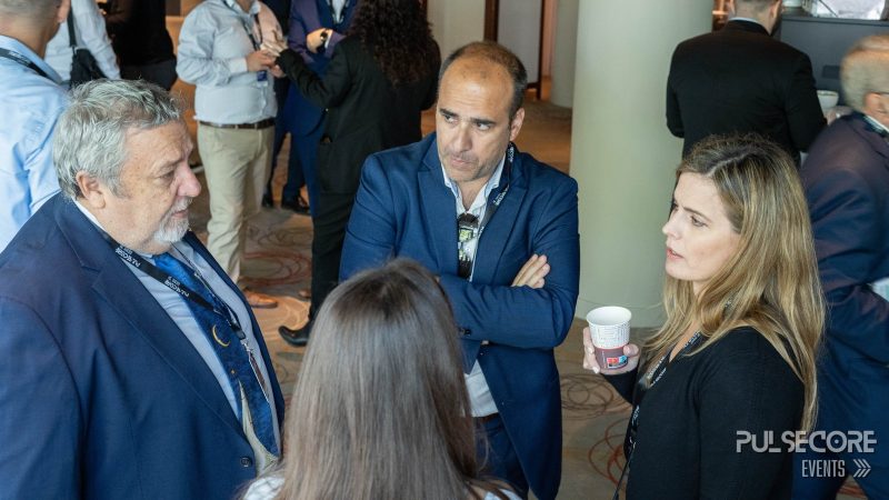 Delegates talking during a coffee break at a previous PulseCore event