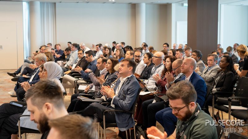 Delegates in the audience applauding during a session at a previous PulseCore event